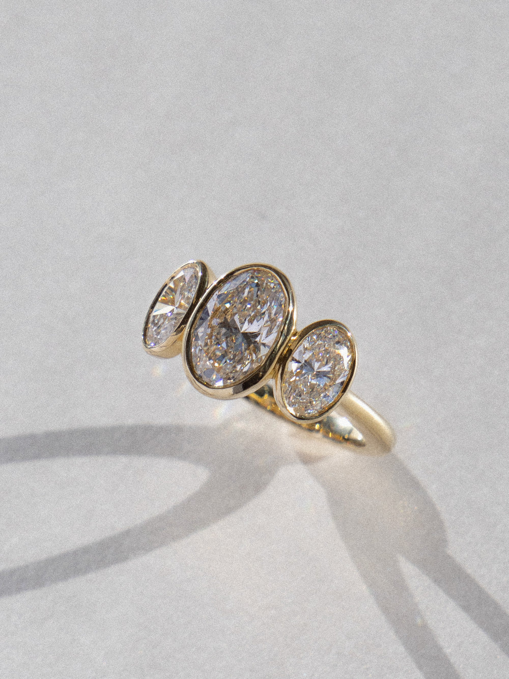 3.71cttw Bezel Oval Trilogy Ring - View