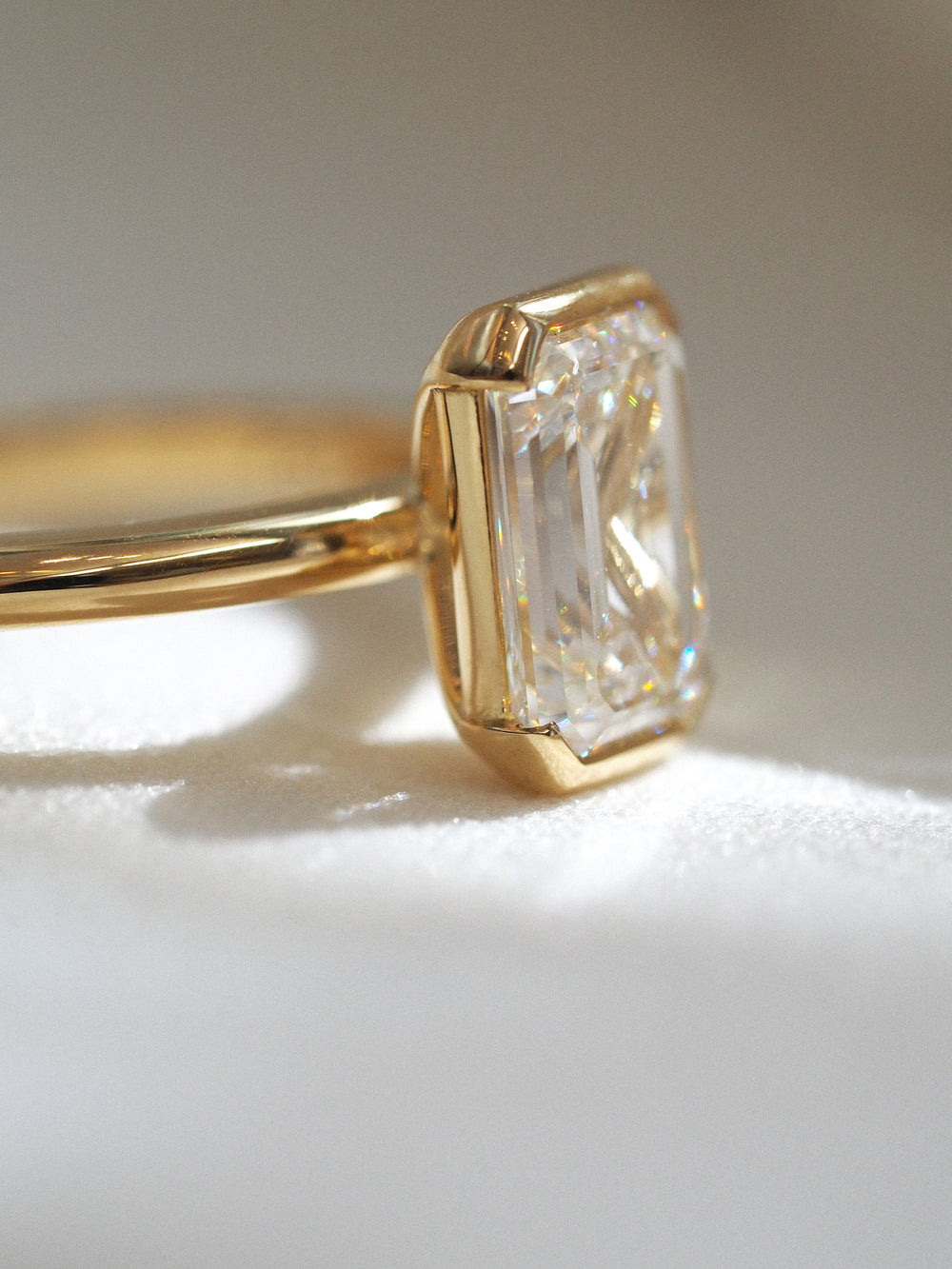 Half Bezel Emerald Solitaire - View