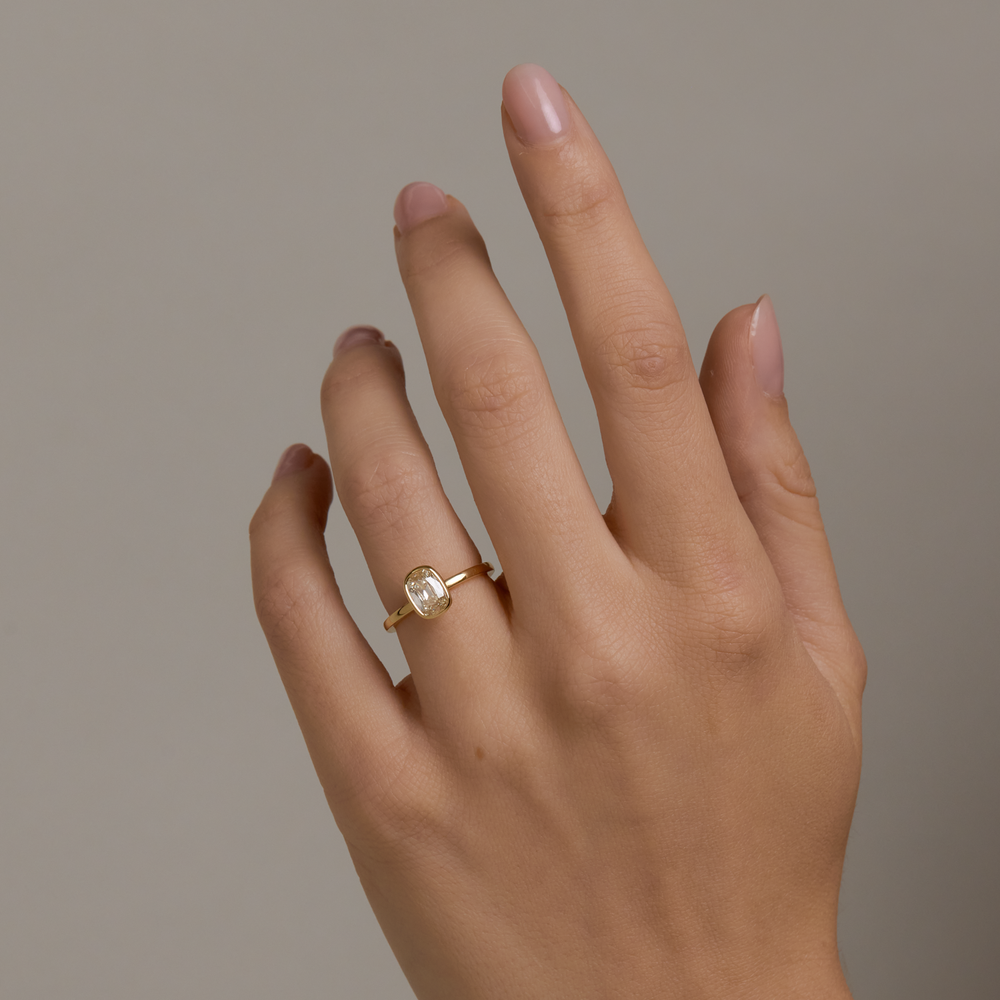 0.95ct Elongated Cushion Signature Bezel Solitaire - View 