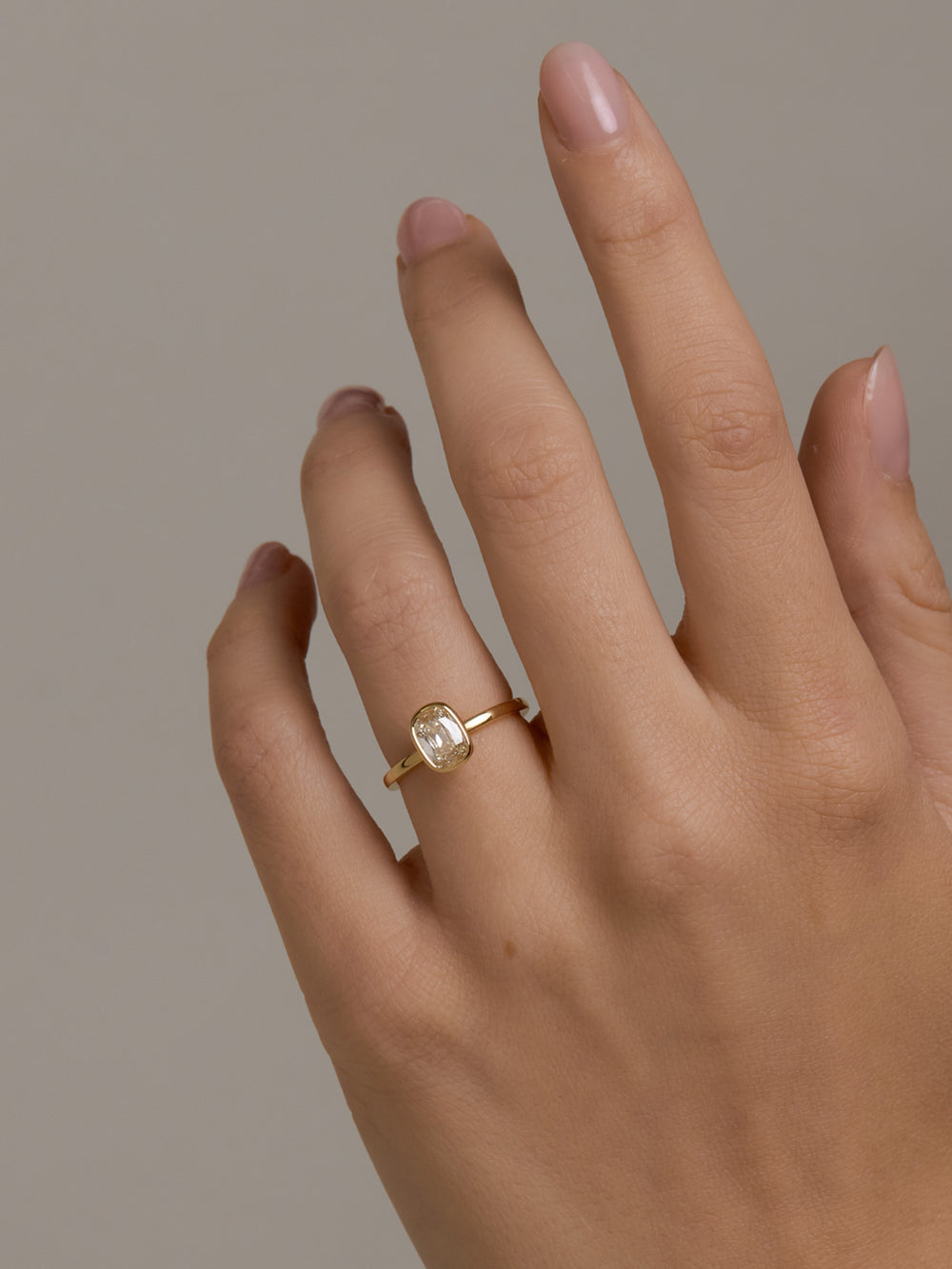 0.95ct Elongated Cushion Signature Bezel Solitaire - View 