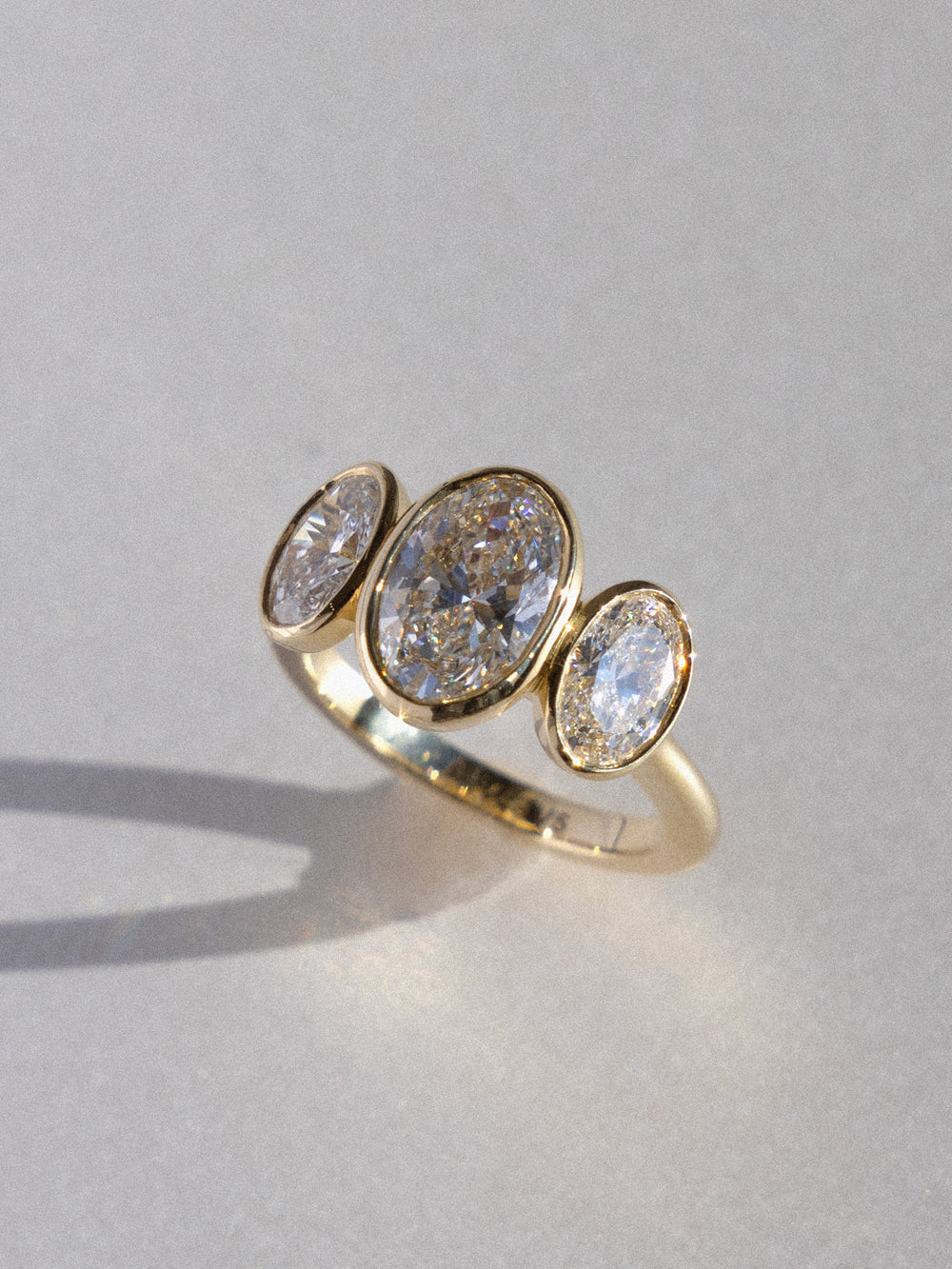 Bezel Oval Trilogy Ring - View 
