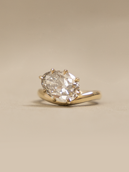 Pear Curved Solitaire Ring