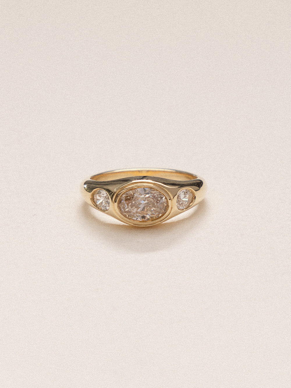 0.93ct Oval Champagne Signet Trilogy Ring