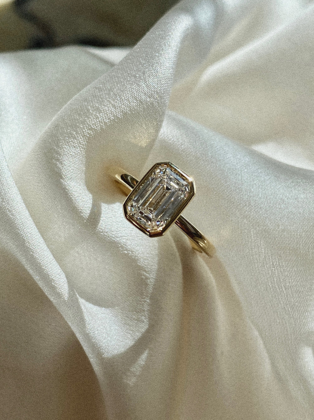 Emerald Signature Bezel Solitaire Ring - View 
