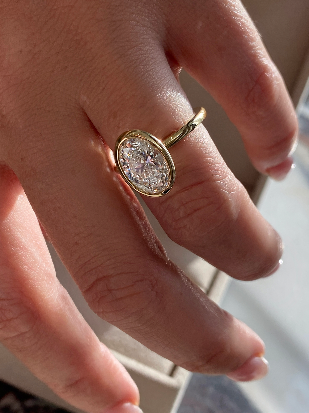 Oval Signature Bezel Solitaire Ring - View 
